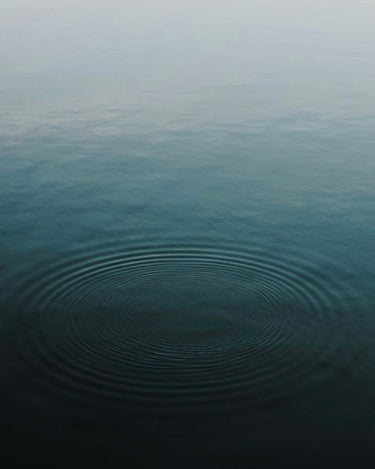 woman-meditating-on-hill