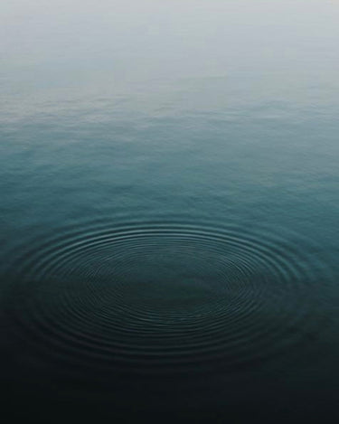 woman-meditating-on-hill